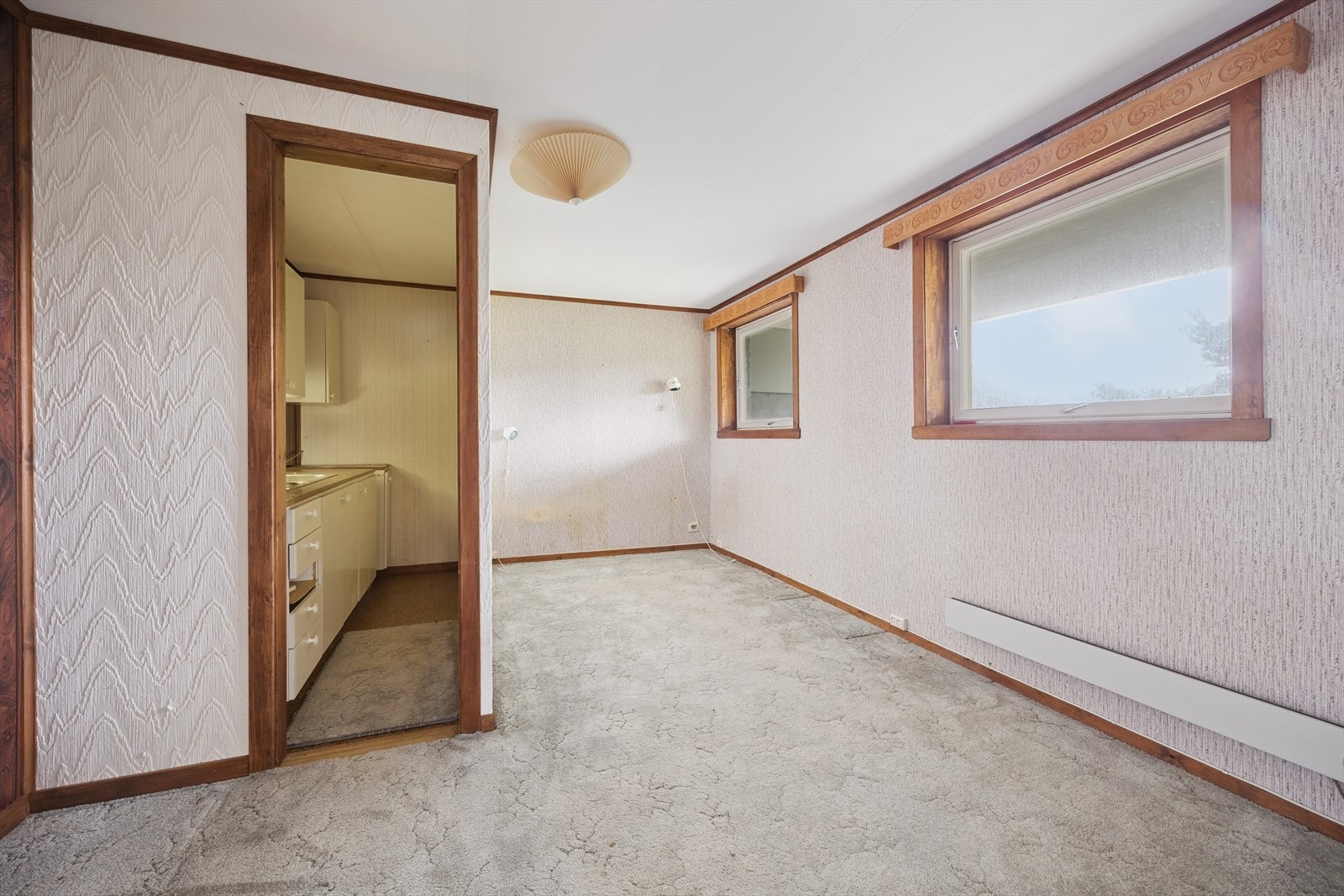 Stue og kjøkkenrom i underetasjen. Galleribilde