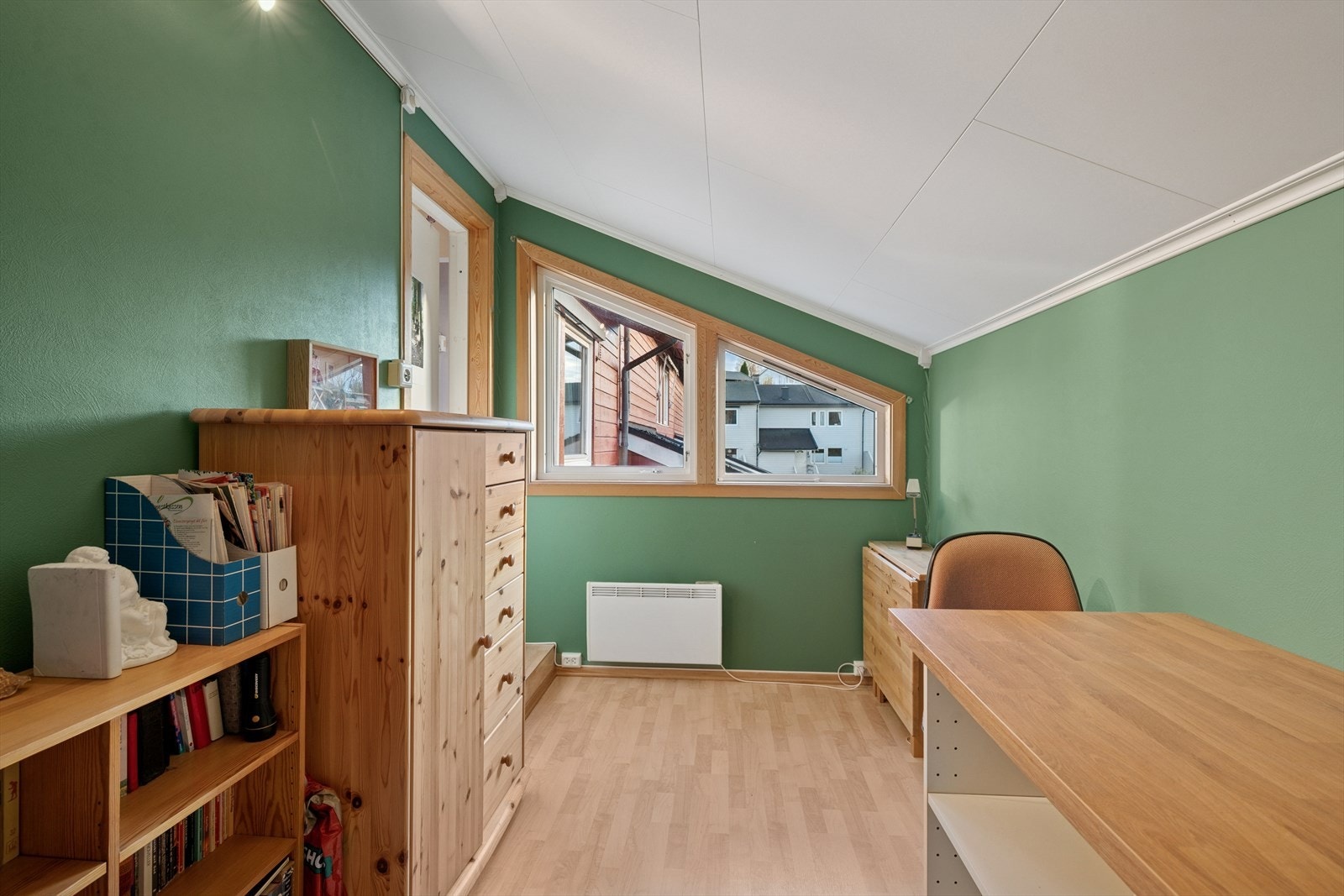 Boligen har også et hobbyrom/arbeidsrom i hver etasje. Galleribilde