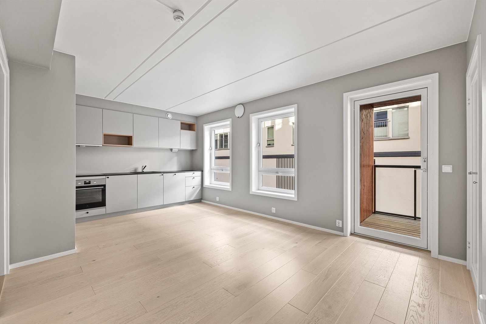 Stue og kjøkken i åpen løsning Galleribilde