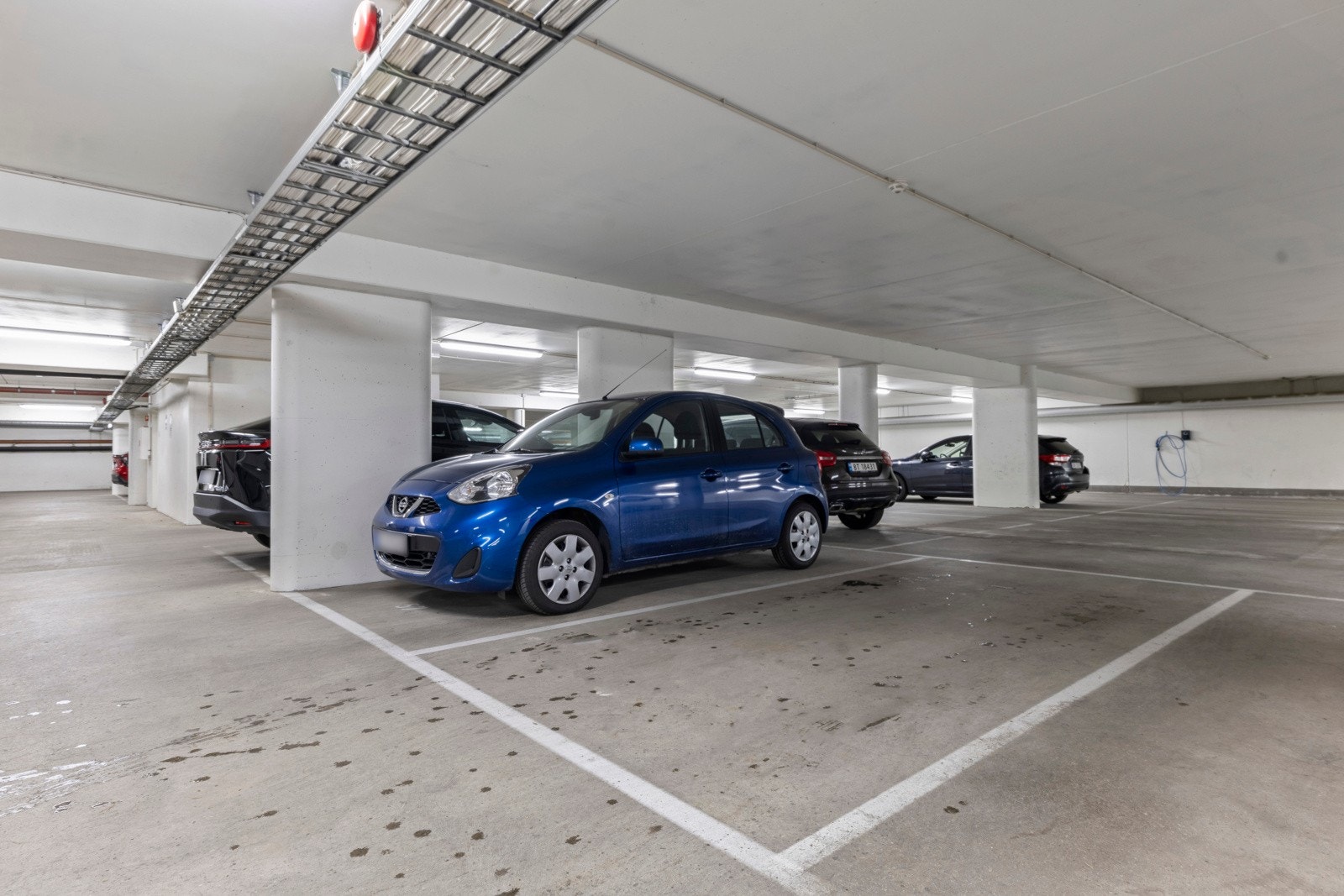 Det følger med en garasjeplass i et felles garasjeanlegg Galleribilde