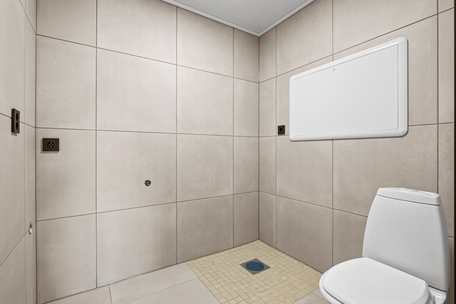 Boligen har et separat vaskerom med toalett. Galleribilde