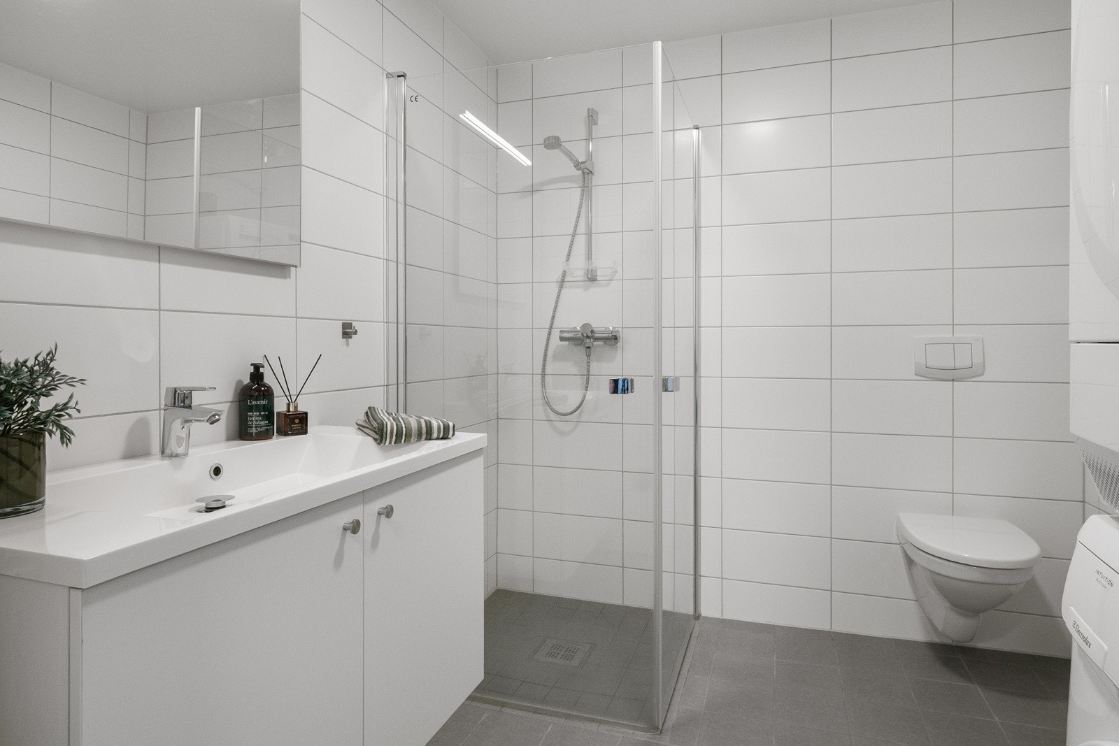 Flislagt bad med gulvvarme. Galleribilde