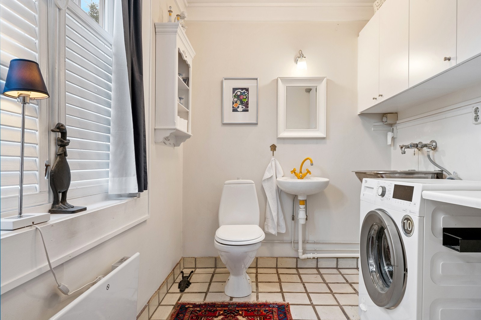 Wc/vaskerom ved inngangen til huset Galleribilde