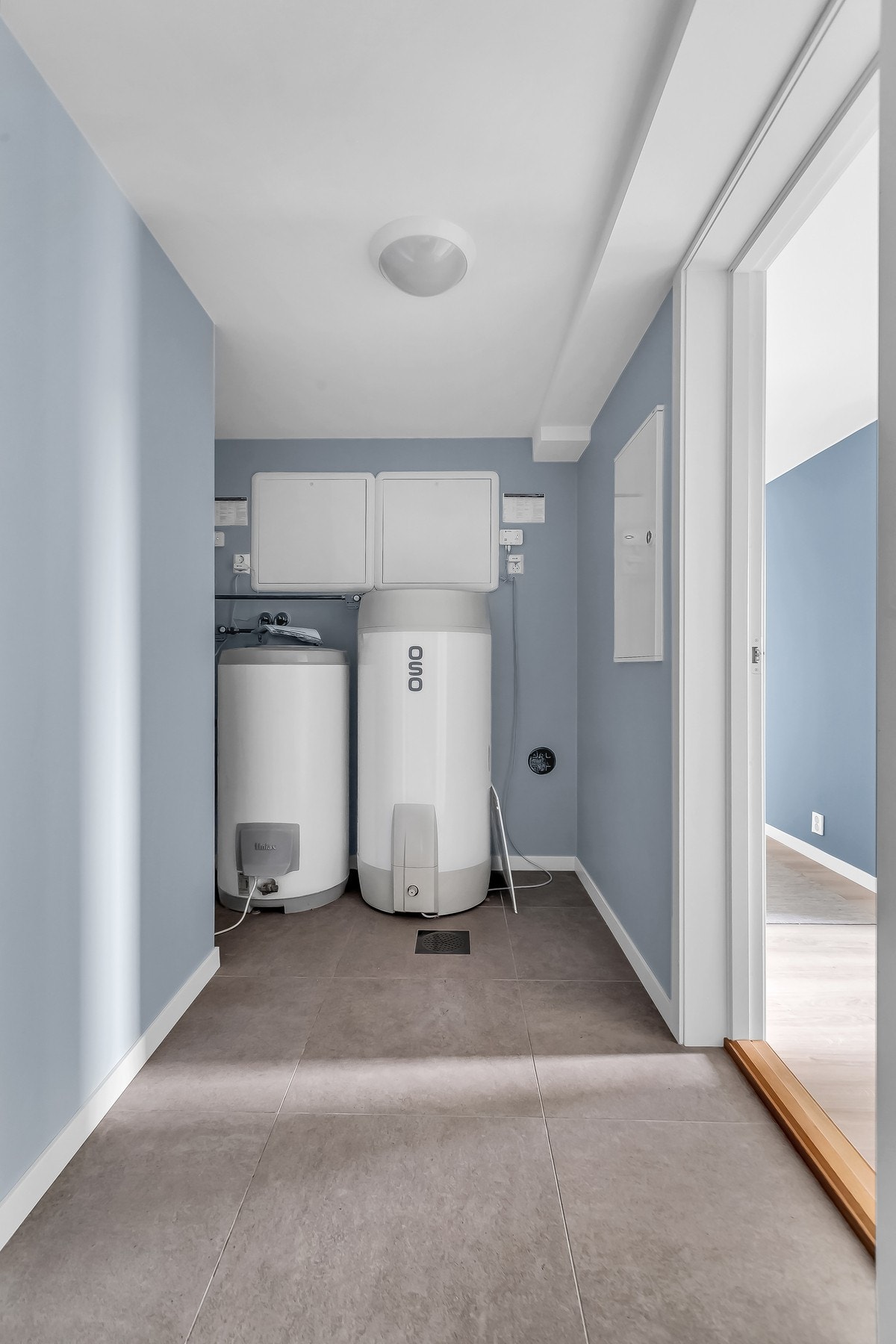 Teknisk rom som skiller trappegangen fra resten av underetasjen. Galleribilde