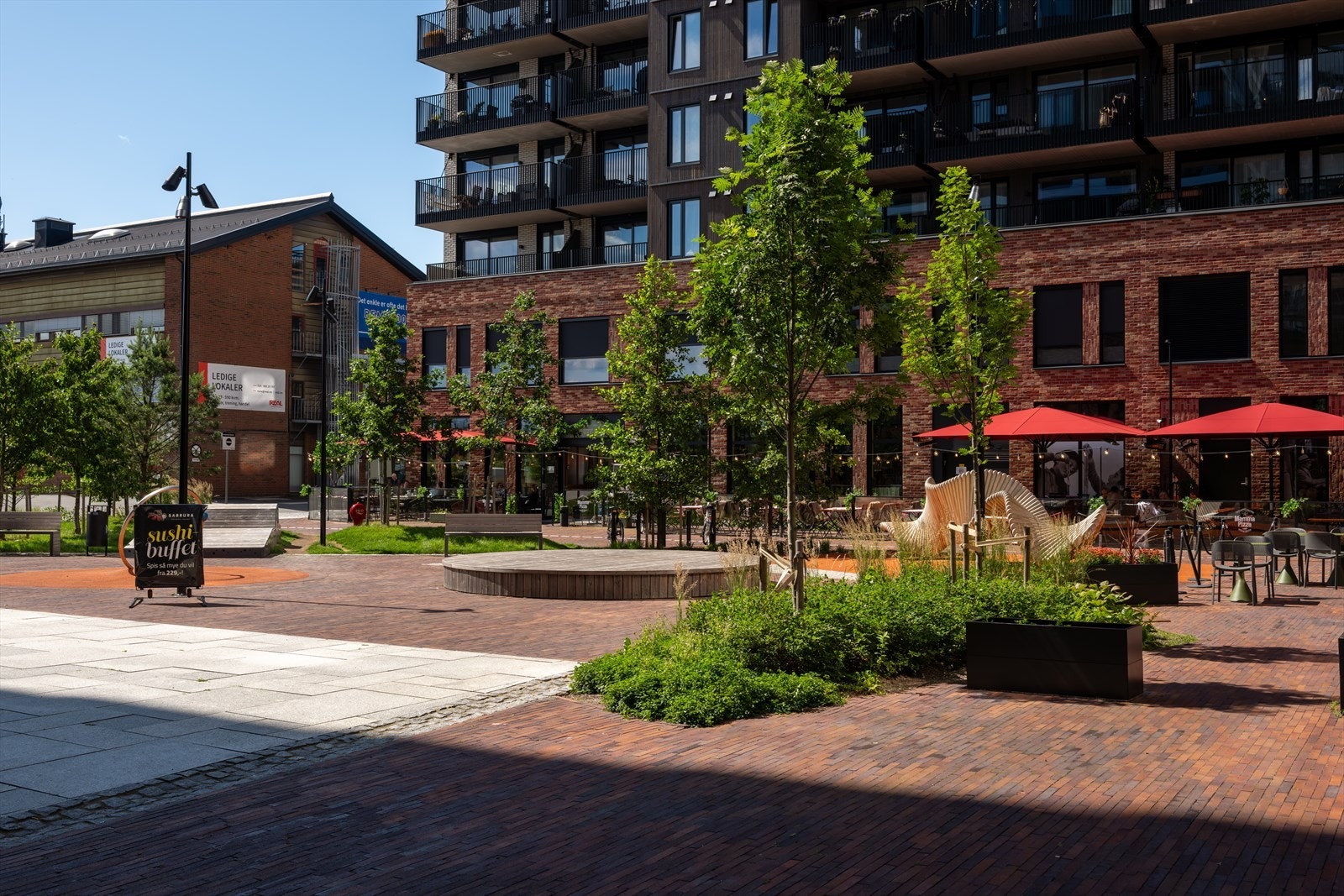 De lekre og innbydende uteområdene i Meierikvartalet setter et eksklusivt preg på omgivelsene. Galleribilde