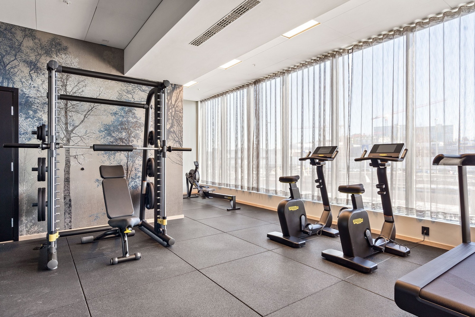 Service Pluss-konseptet byr også på et velutstyrt treningsrom. Galleribilde