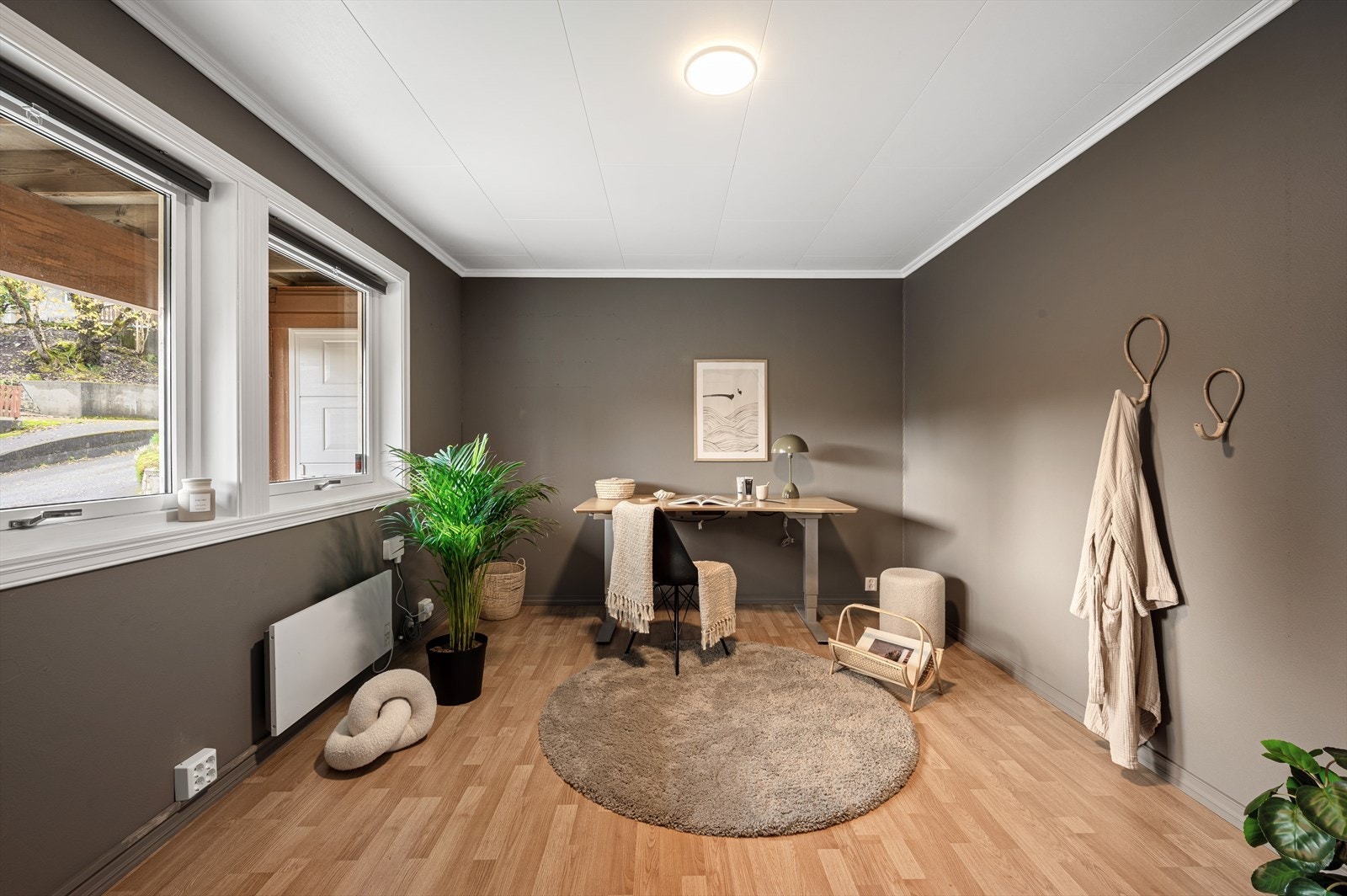 Stort rom malt i delikat farge, Det gjøres oppmerksom på at rommet er angitt som bod på bygningstegningene og er ikke omsøkt. Galleribilde