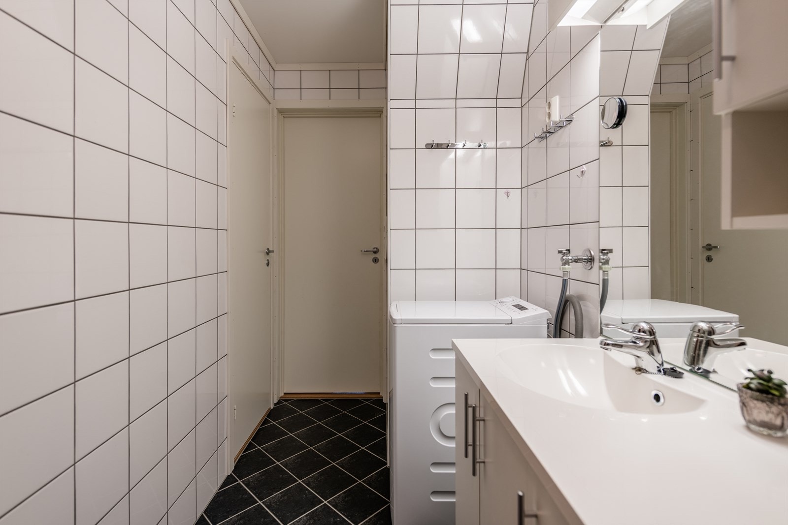 Flislagte overflater. Galleribilde