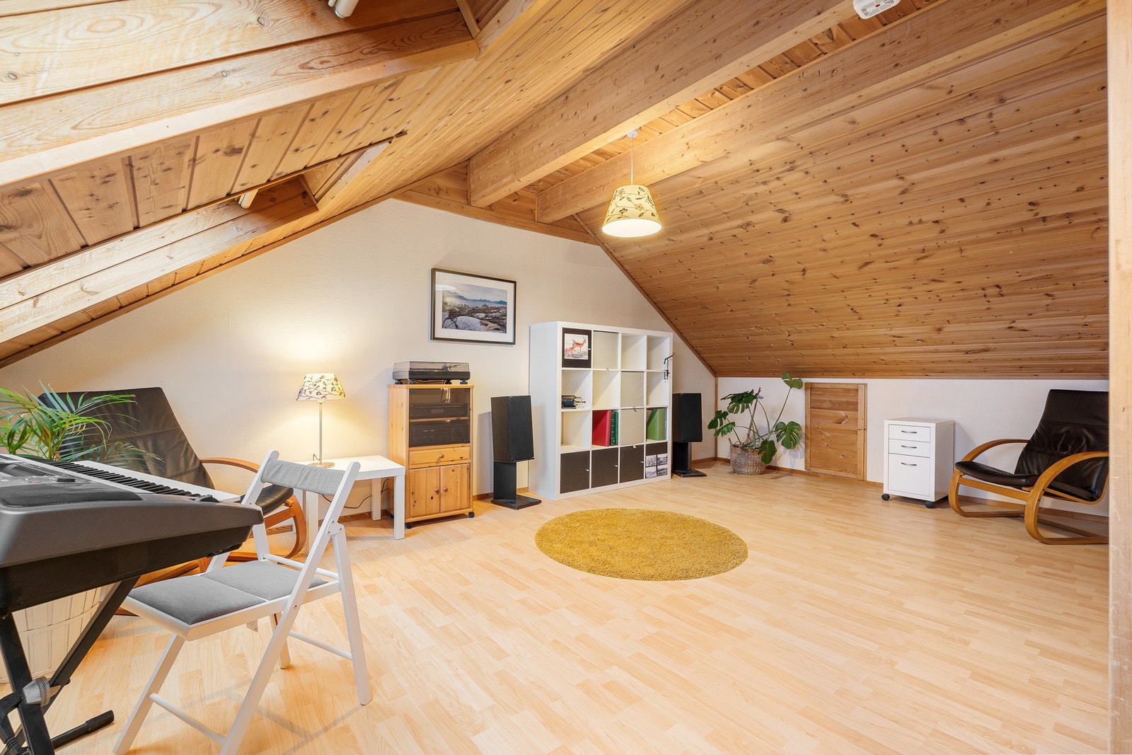 Loftsareal som brukes som ekstra stue. Galleribilde