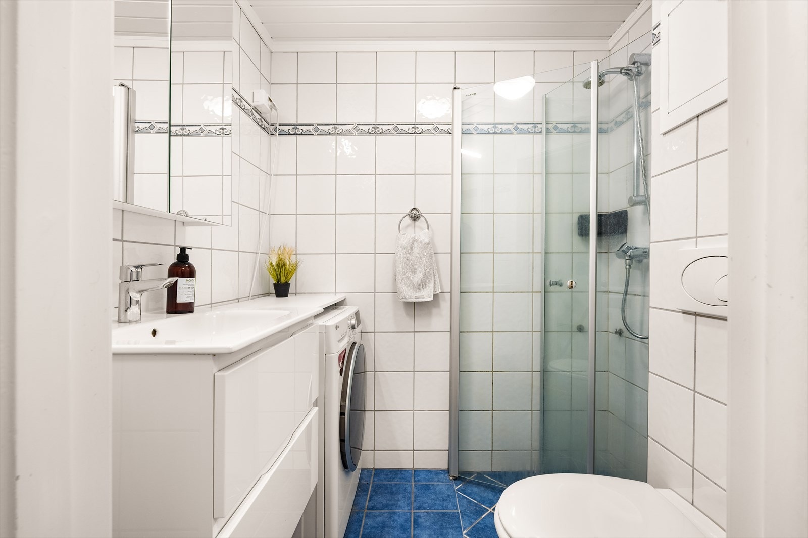 Flislagt bad med gulvvarme Galleribilde