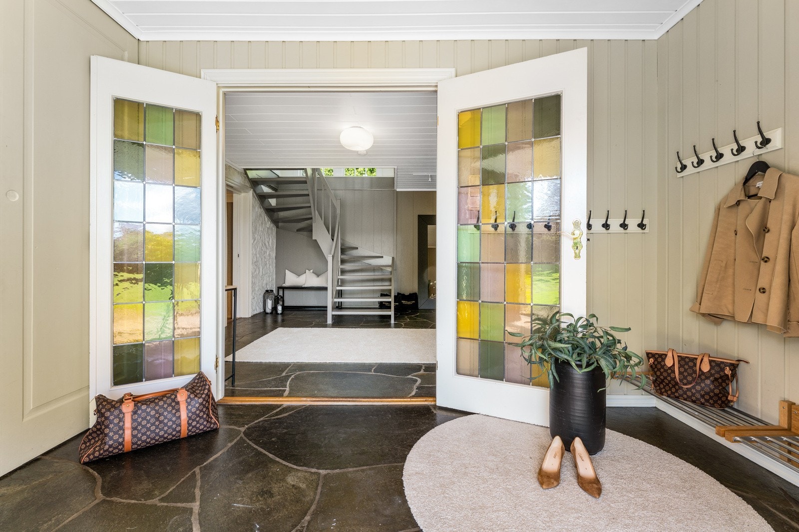 Her kan man ønske gjester velkommen med stolthet Galleribilde