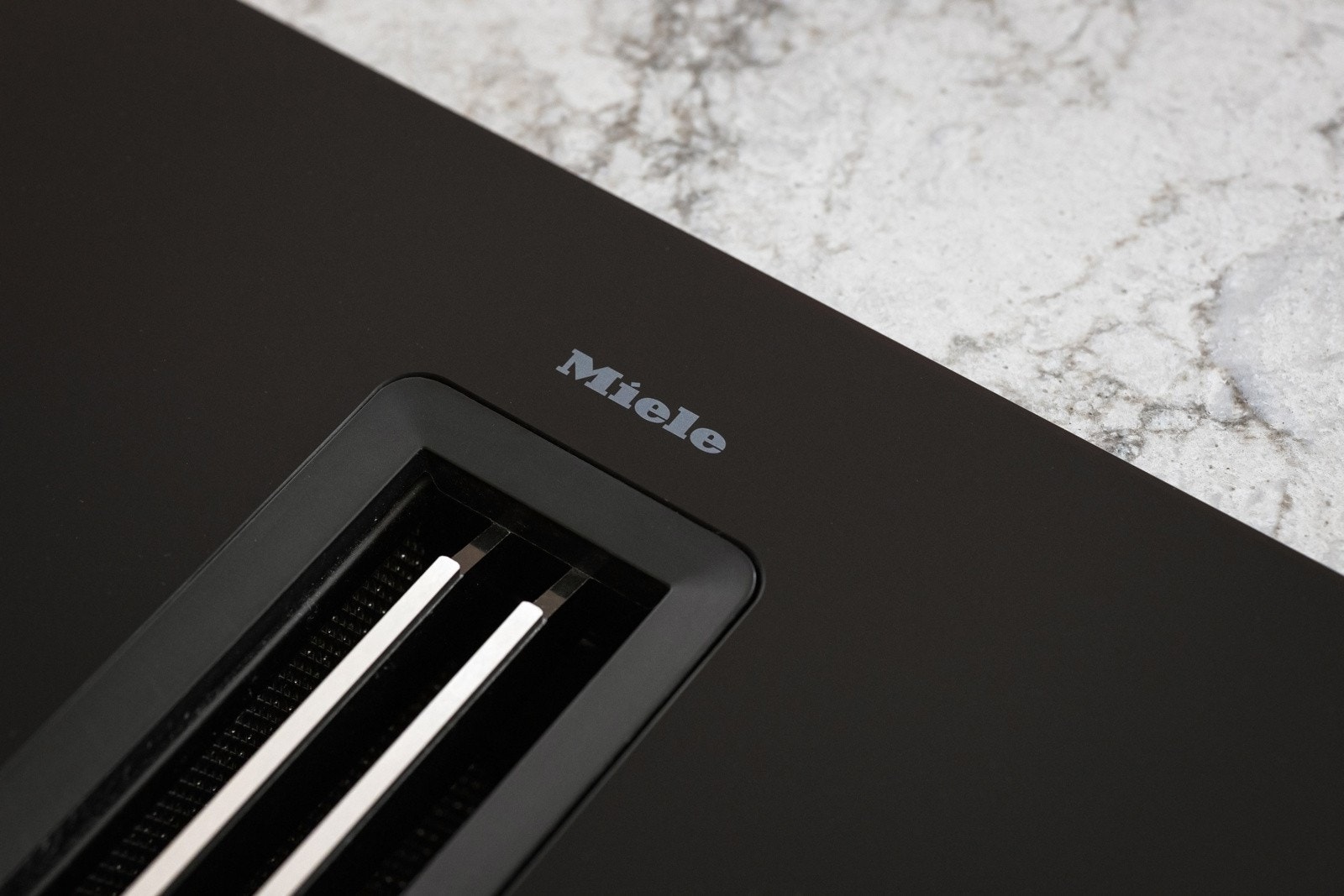 Integrerte kvalitets hvitevarer fra Miele på kjøkkenet.