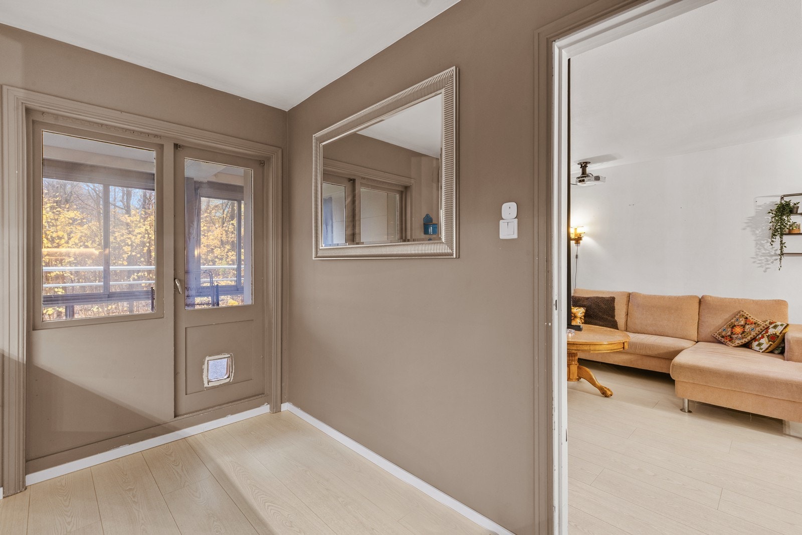 Kjøkken med utgang til stor, innglasset balkong på 18 kvm. Galleribilde