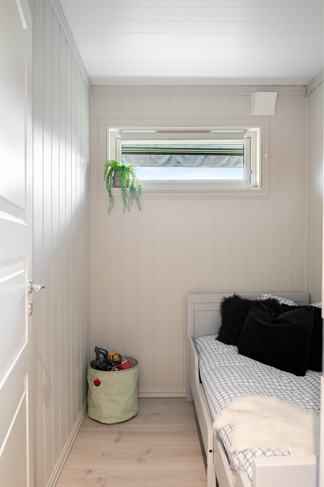 Det originale baderommet er i dag innredet som et lite soverom. Galleribilde