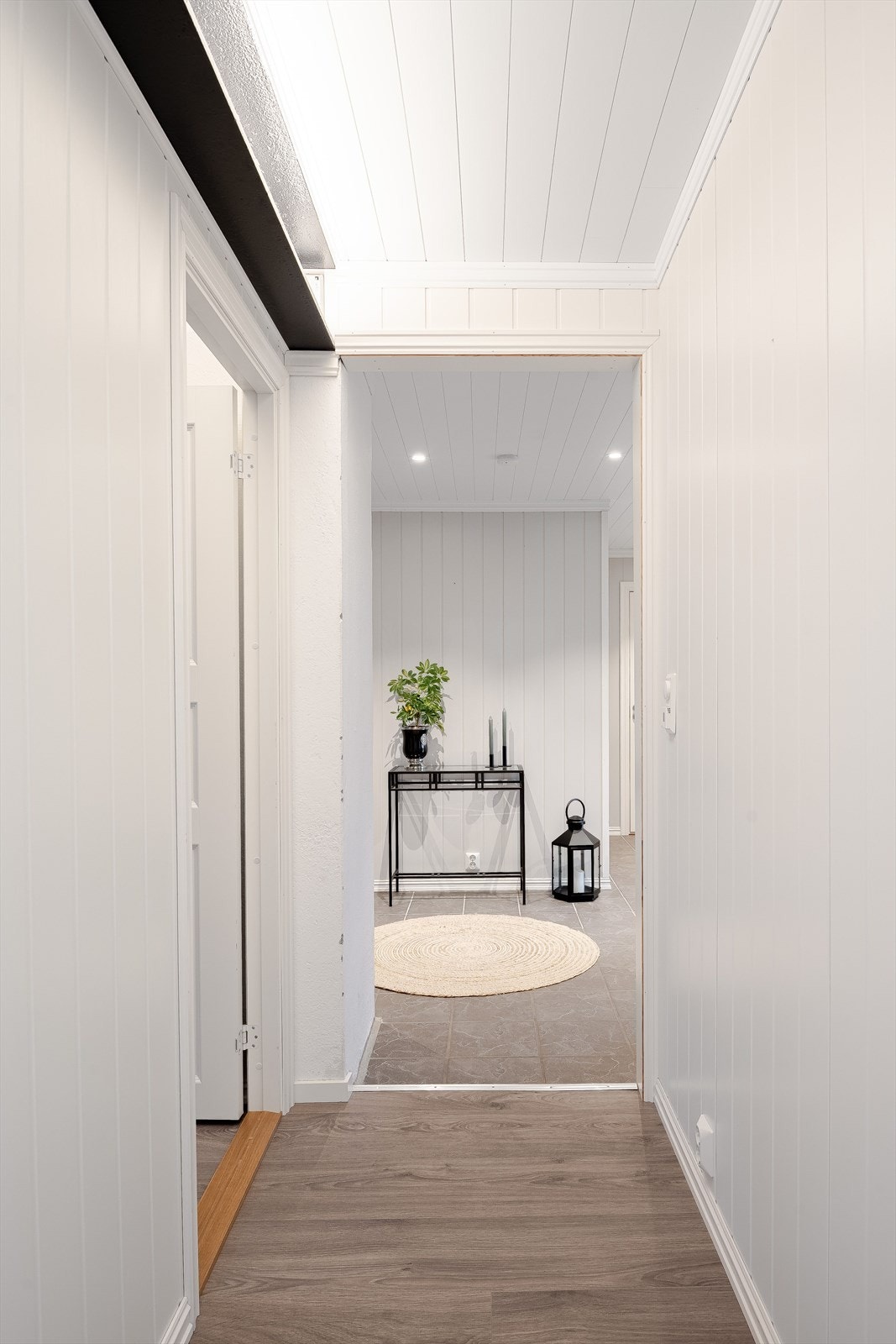 Mellomgang mellom rommene som er innredet som soverom. Galleribilde