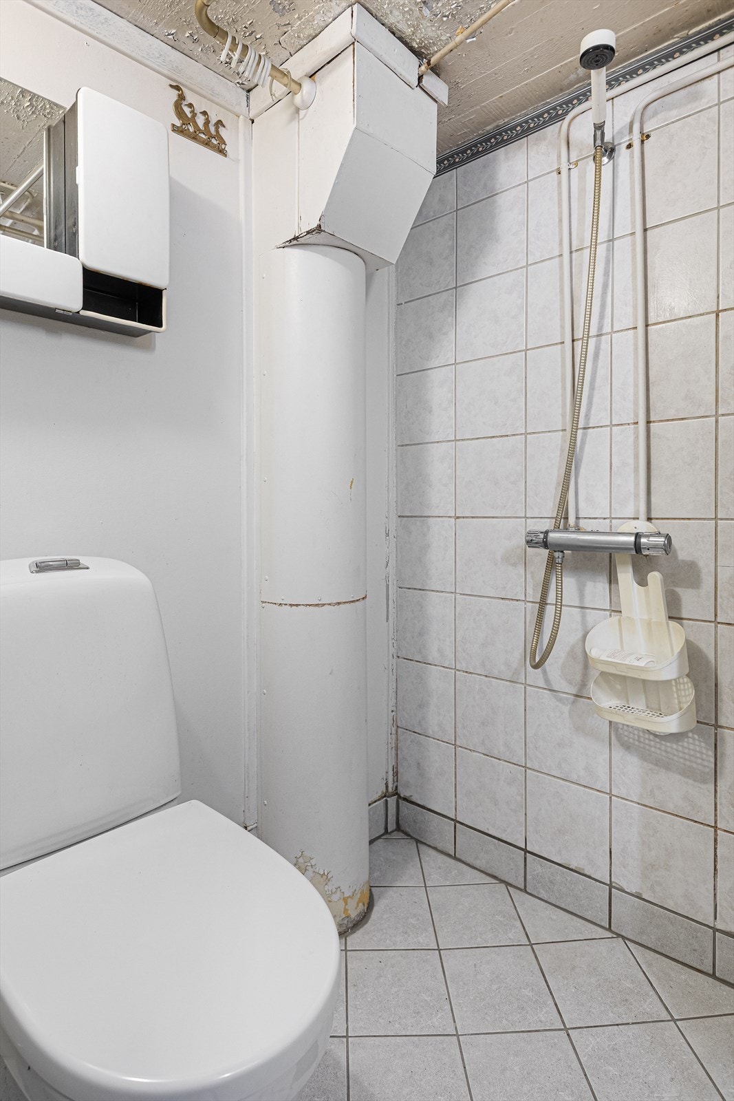 Flislagt bad med gulvvarme. Galleribilde