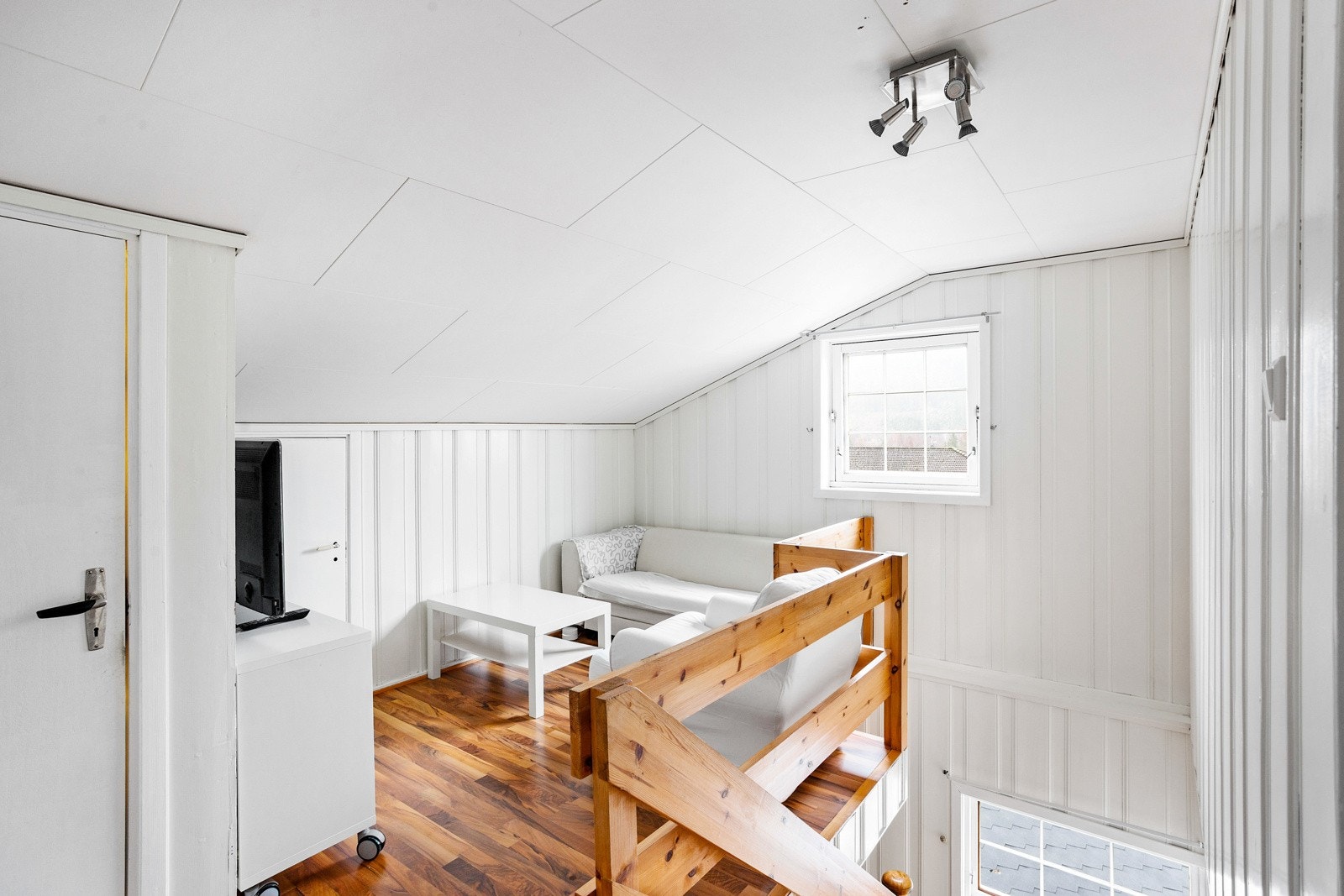 En liten og intim loftstue i 3. etasje. Galleribilde