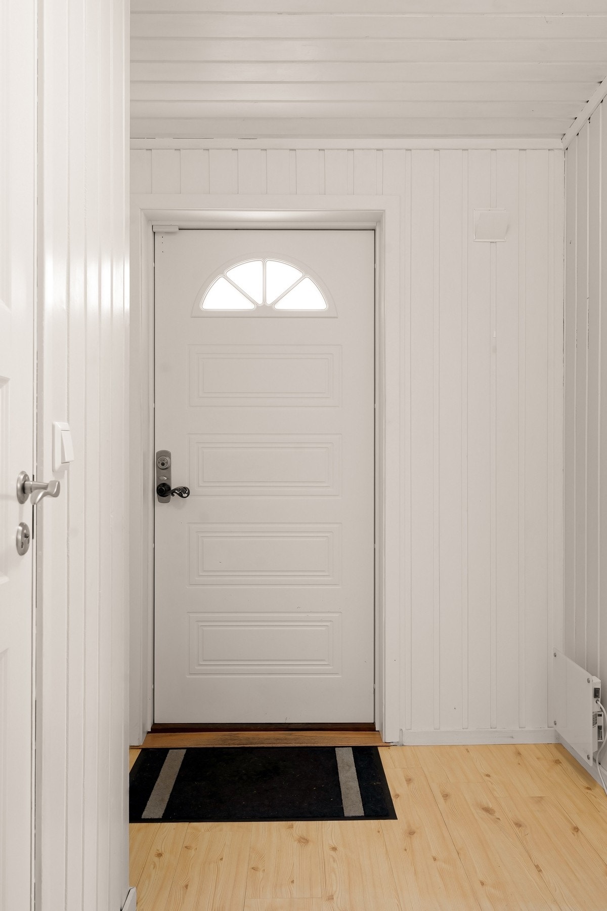 Du ønskes velkommen inn i en lys entré Galleribilde