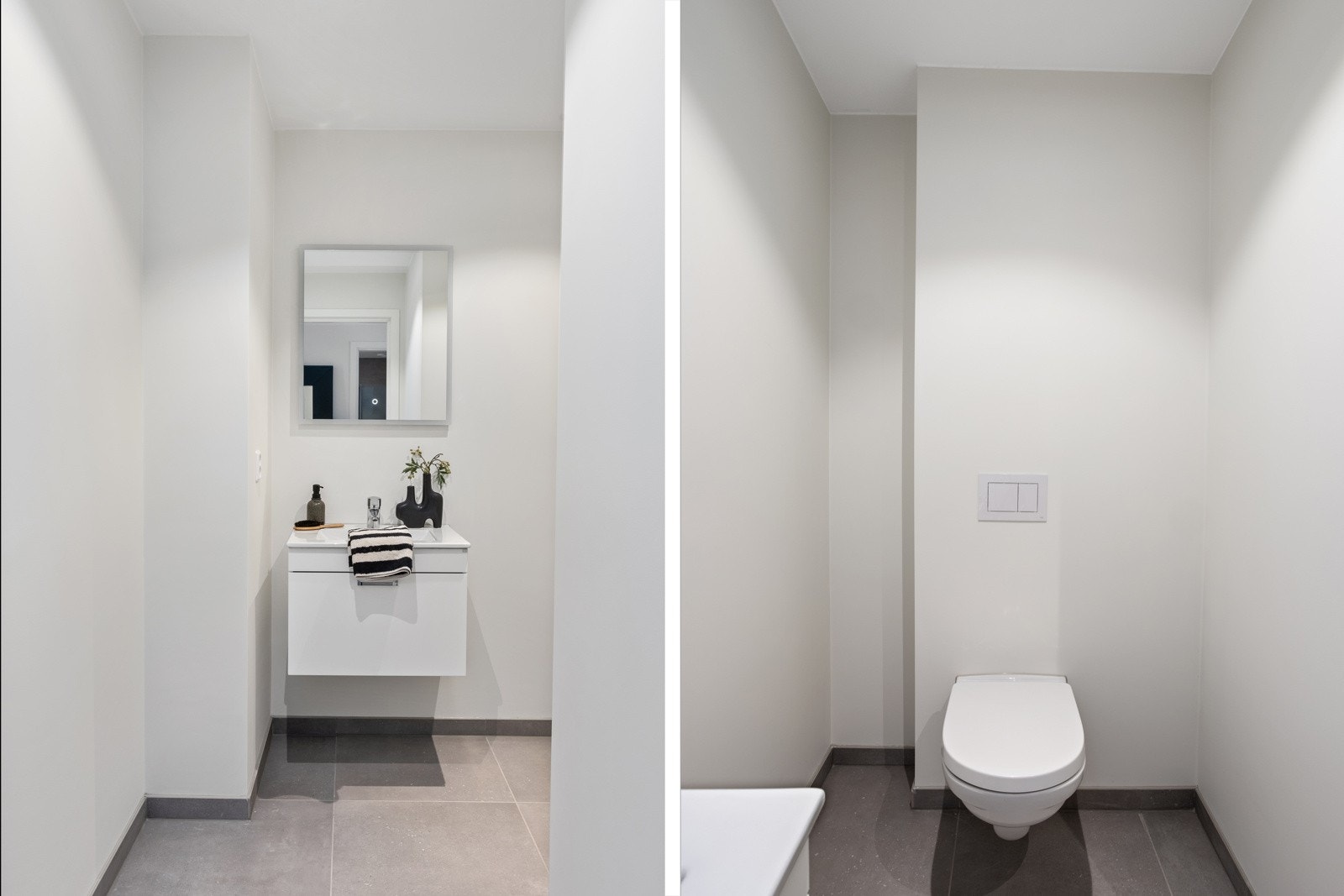 Lyst og moderne bad med vegghengt toalett og servant med speil. Galleribilde