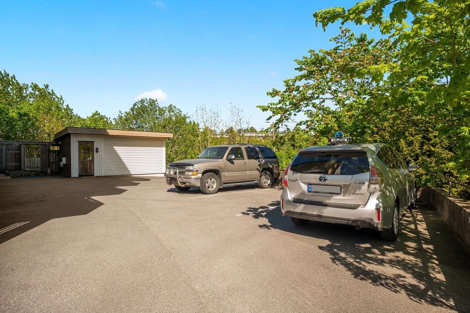 Felles parkeringsplass Galleribilde