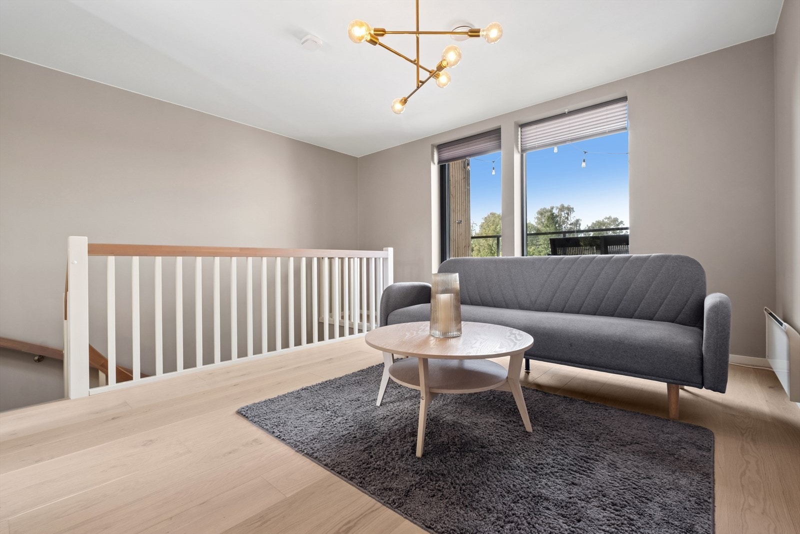 Når du ankommer øverste etasje, blir du møtt på en koselig stue. Galleribilde