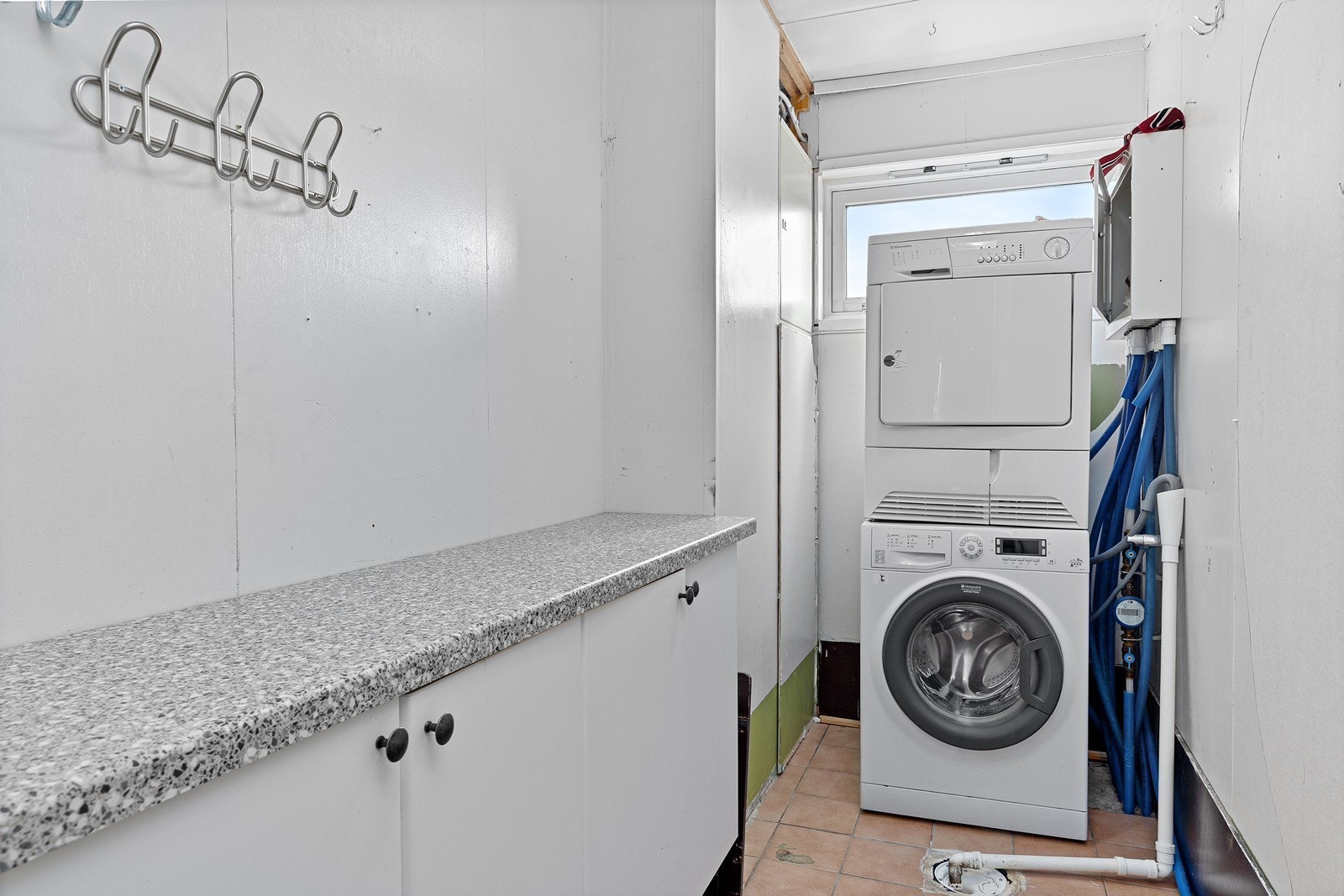 Vaskerom med opplegg for vaskemaskin. Galleribilde