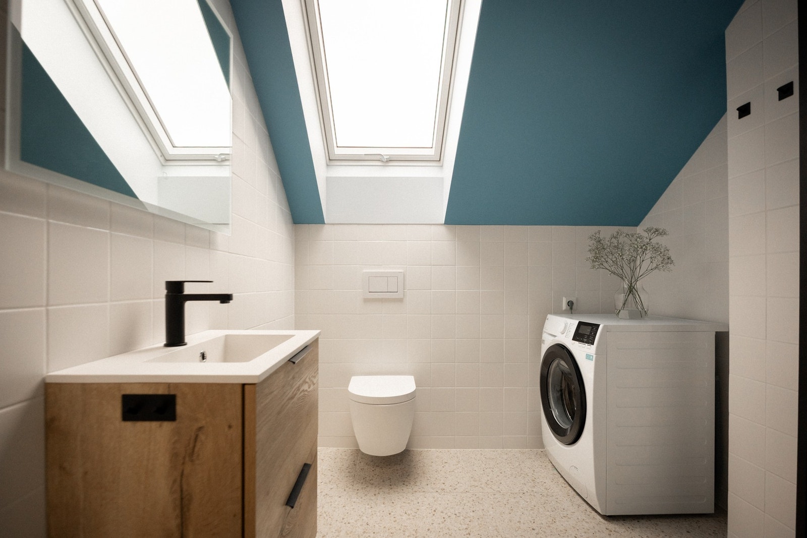 Badet har opplegg for vaskemaskin. Galleribilde