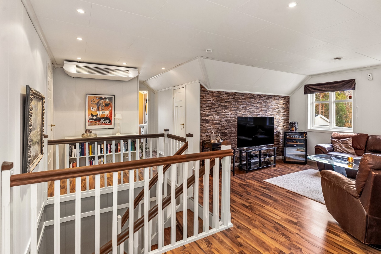 Mellomstuen kan innredes som lounge, lesekrok eller en tv-stue. Galleribilde