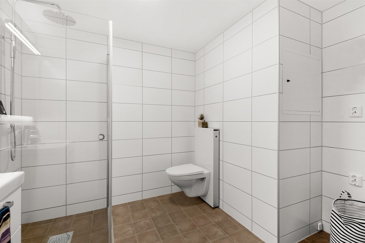 Badet har opplegg til vaskemaskin. Galleribilde