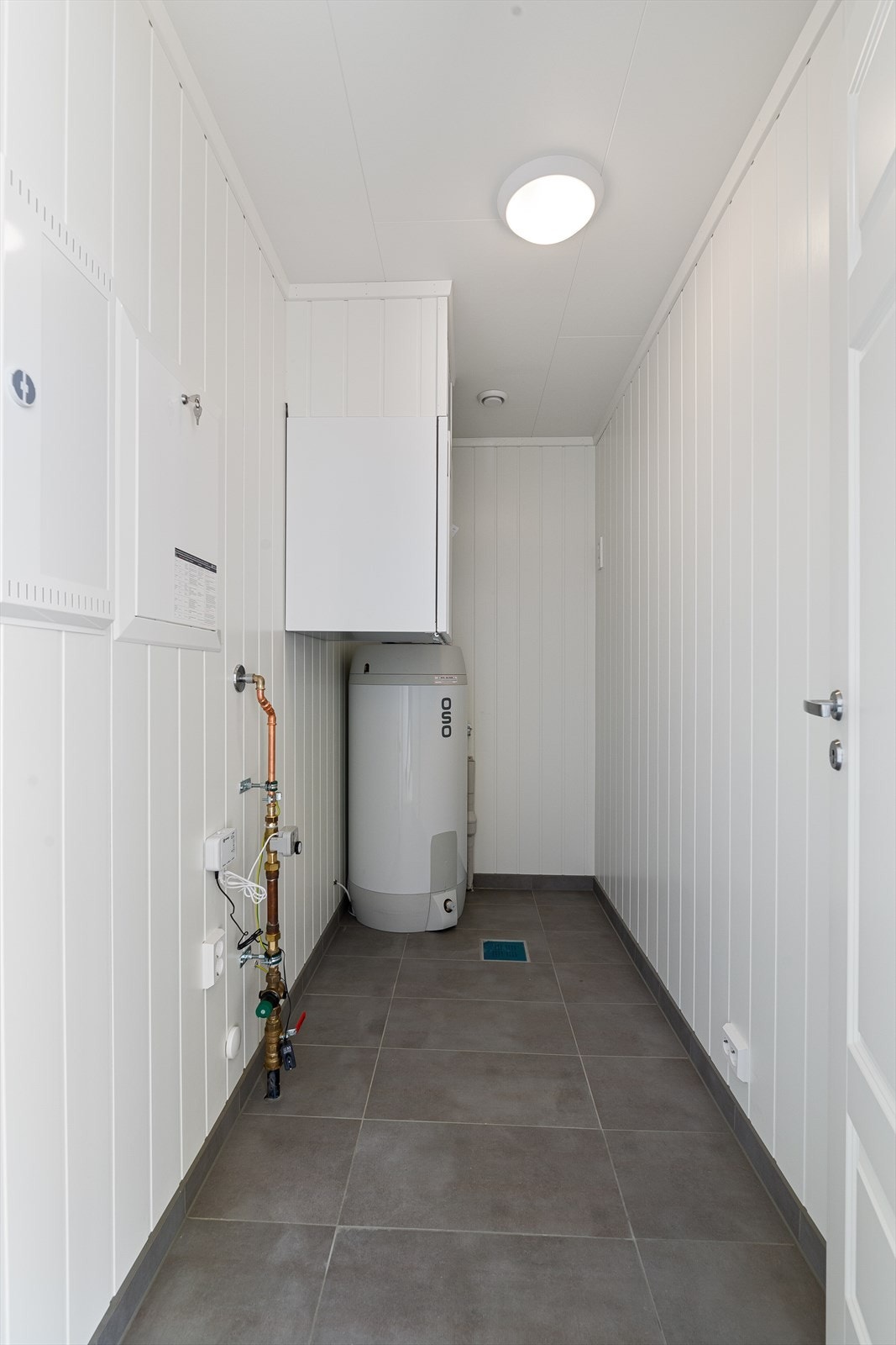 Praktisk innvendig bod med rom for ekstra oppbevaringsplass. Galleribilde