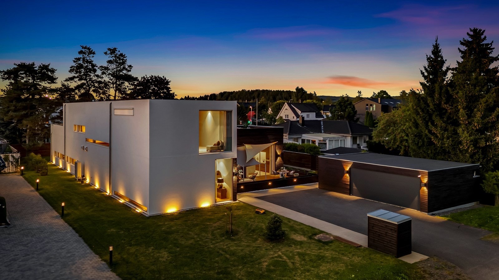 Dette stilrene, arkitekttegnede huset kombinerer funksjonalitet med estetikk. Galleribilde