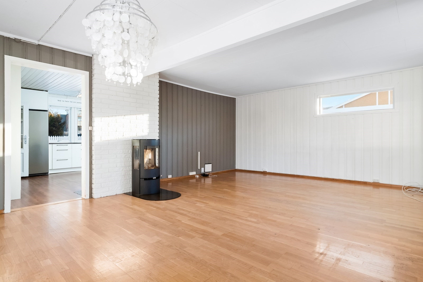 En vedovn gir både varme og en hyggelig atmosfære i stuen. Galleribilde