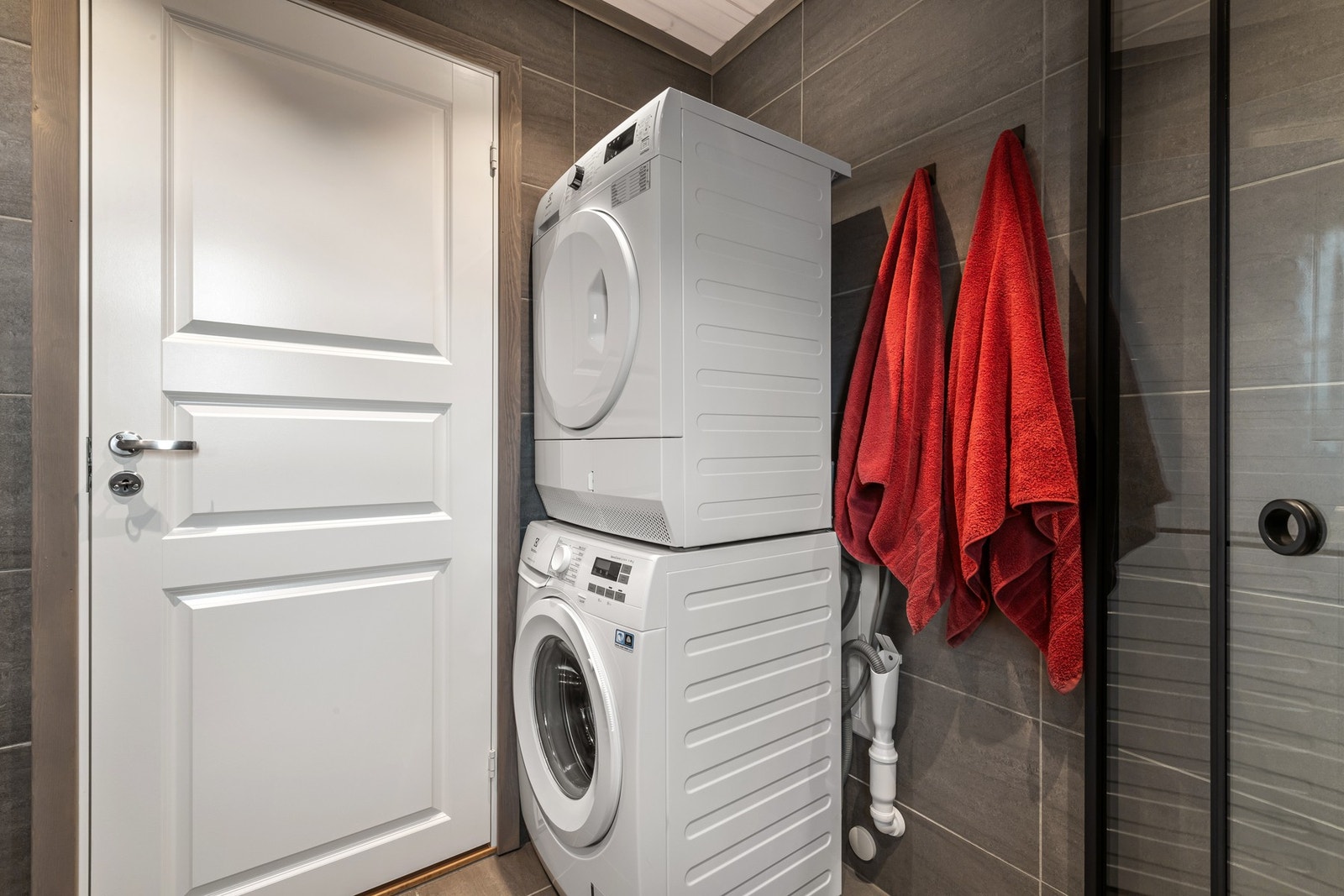 Badet har opplegg for vaskemaskin. Galleribilde