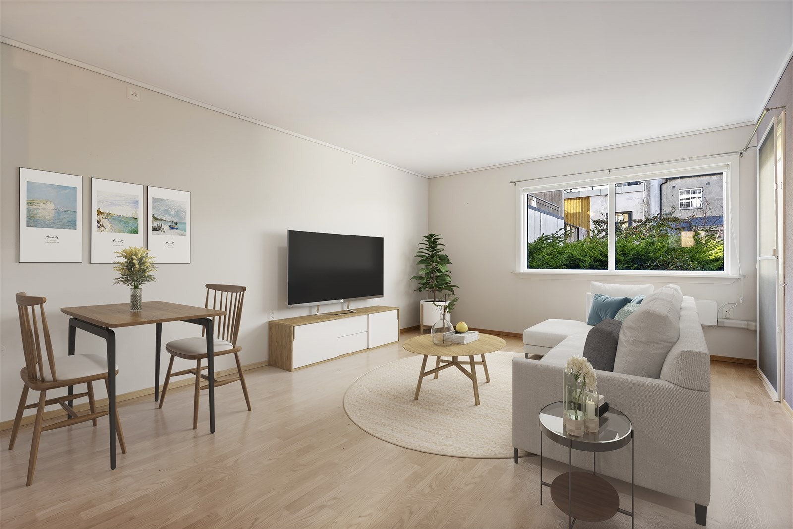 Stue og kjøkken i åpen løsning skaper en hyggelig og sosial arena. Dette bildet er digitalt møblert. Galleribilde