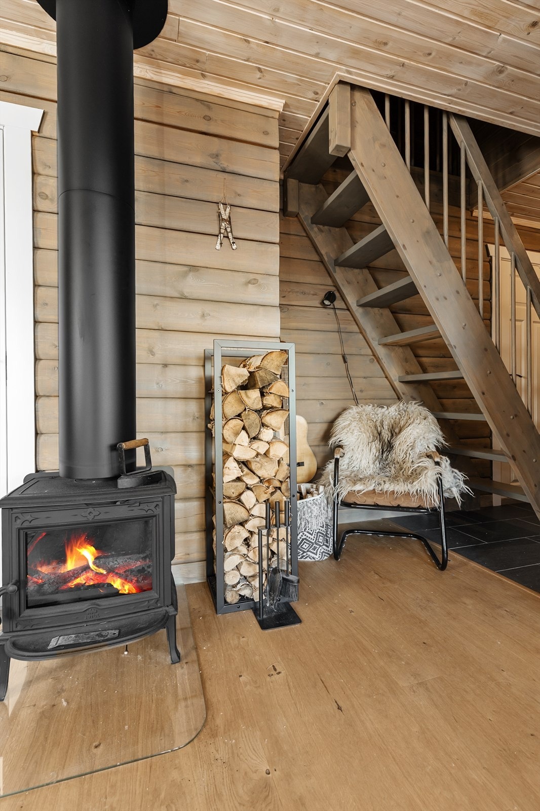 Kosekroken ved peisen er et herlig sted å slappe av på. Galleribilde