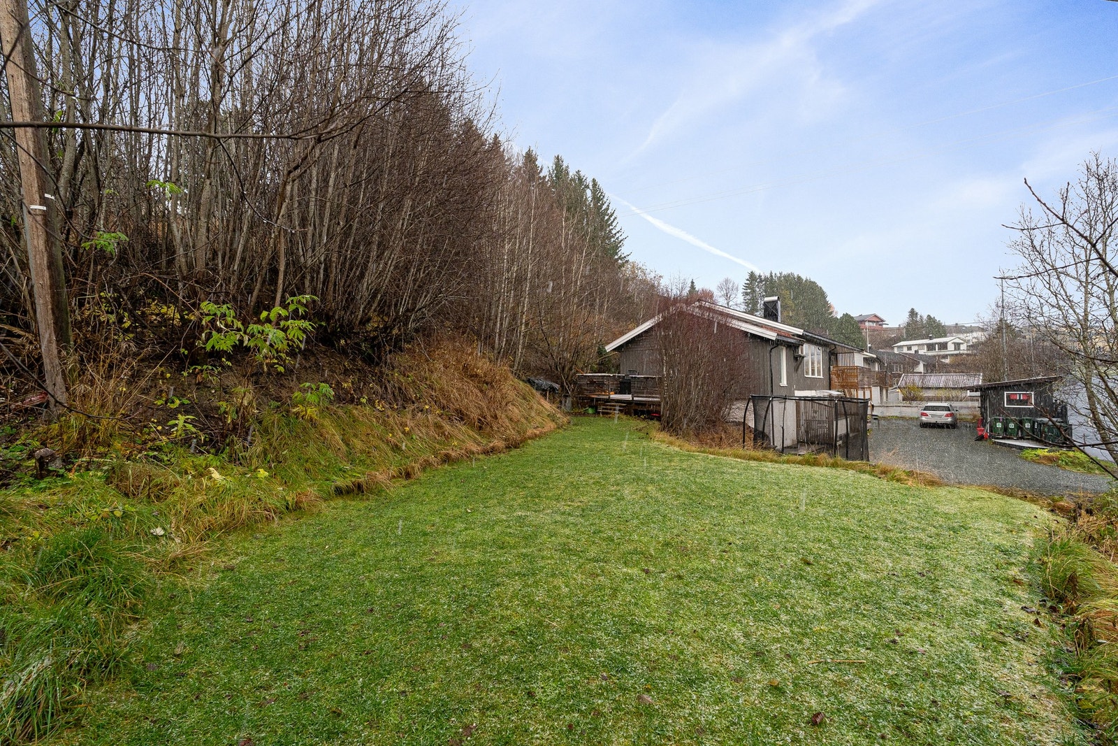 Stor felles hagetomt som kan benyttes av beboerne. Galleribilde