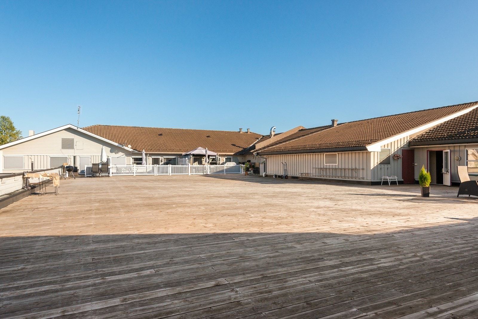 Takterrasse med flotte solforhold Galleribilde