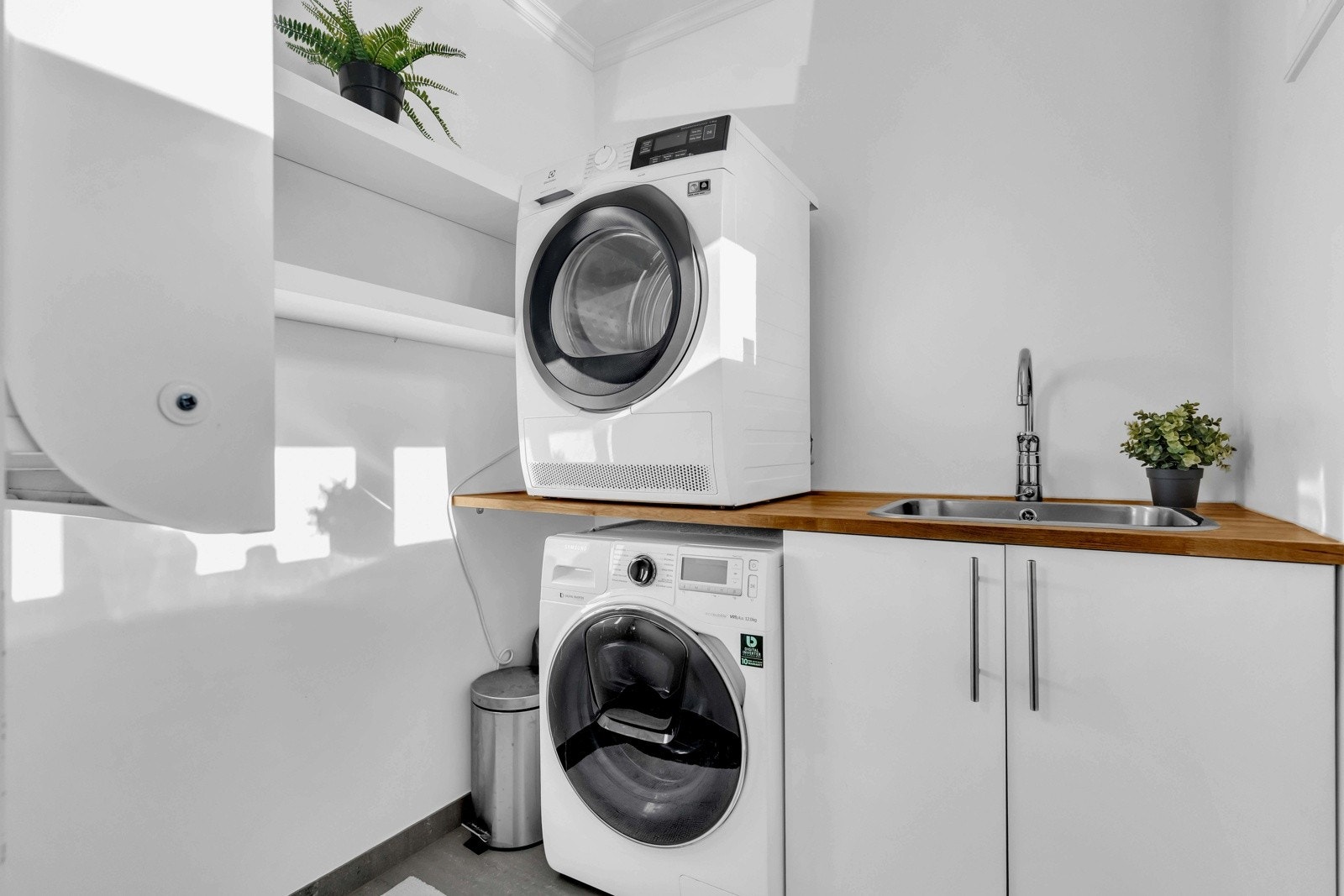 Det er eget separat vaskerom i boligen 1. etasje Galleribilde