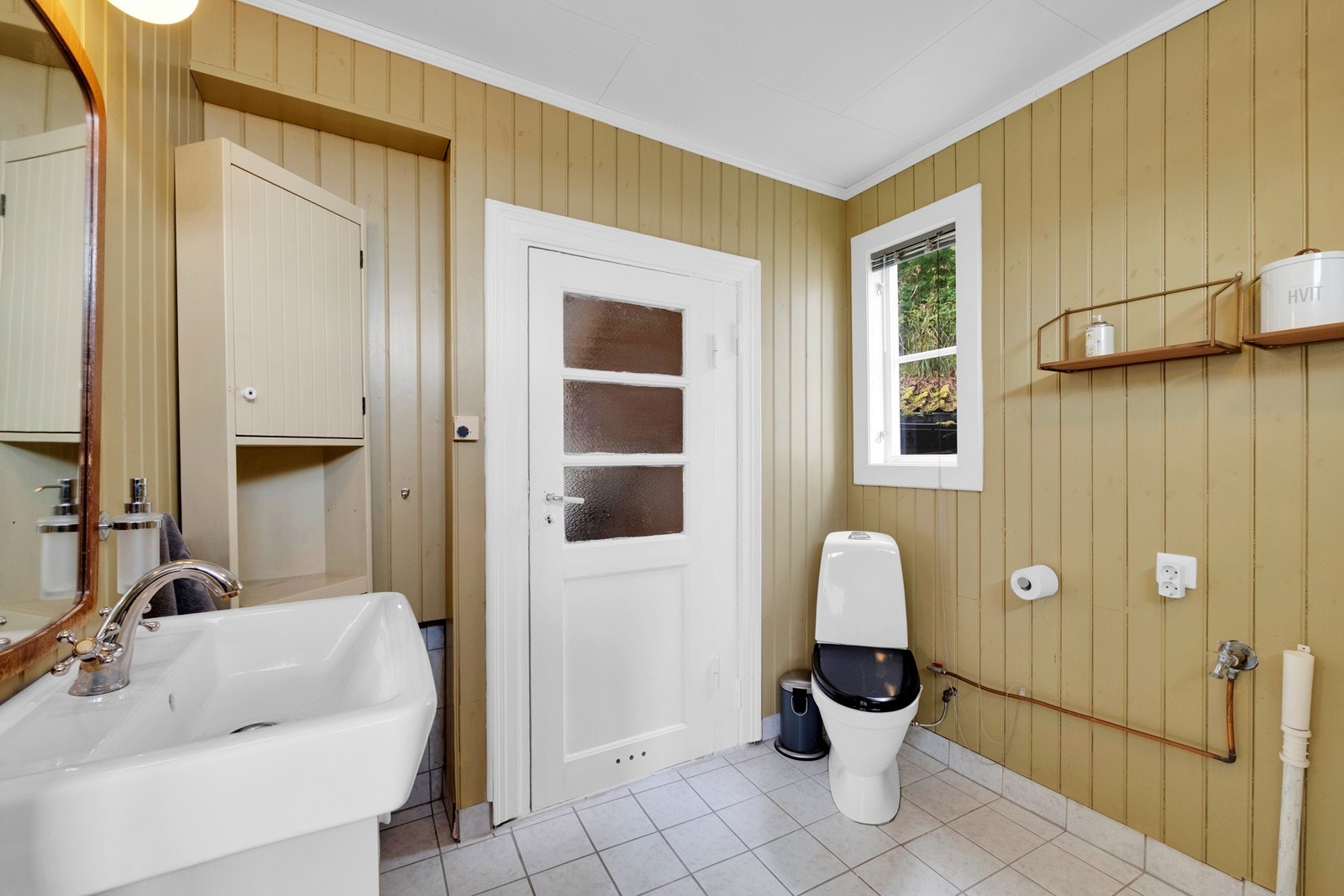 Et bad som forener husets opprinnelige stil med moderne fasiliteter. Galleribilde