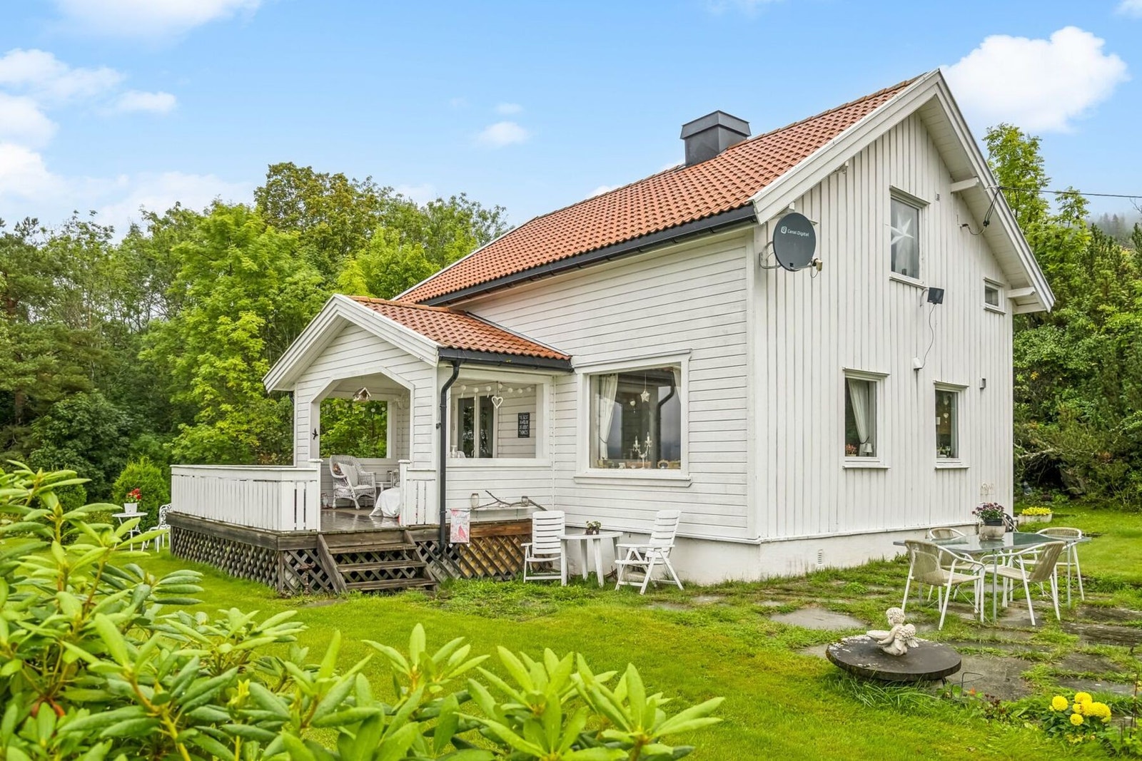 En sjarmerende enebolig over to plan. Galleribilde