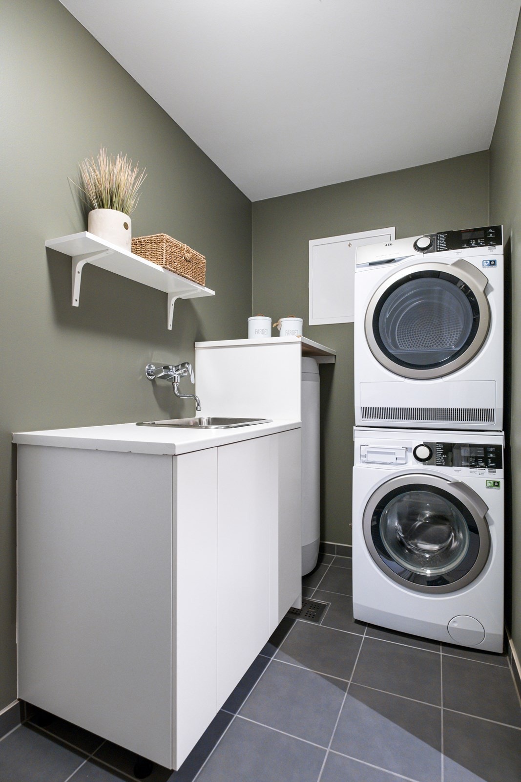 På vaskerommet er det fliser med varmekabler Galleribilde