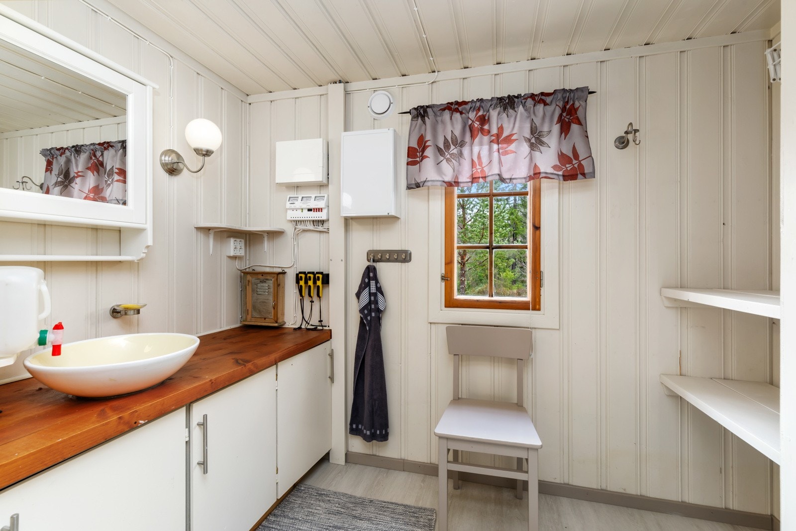 Det tredje soverommet er gjort om til et stellerom/vaskerom. Galleribilde