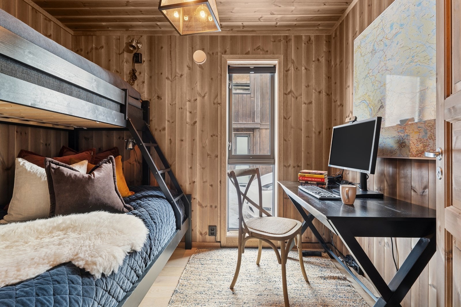 Soverommene ligger i hyttas underetasje. Galleribilde