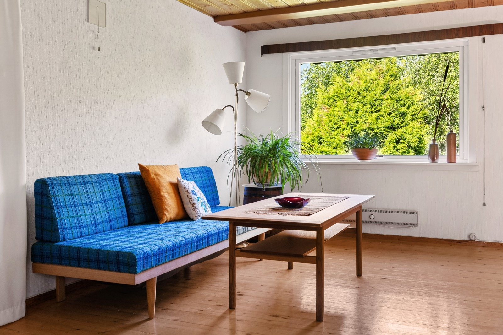 Rommet har god plass til en hyggelig sofagruppe for avslapning. Galleribilde