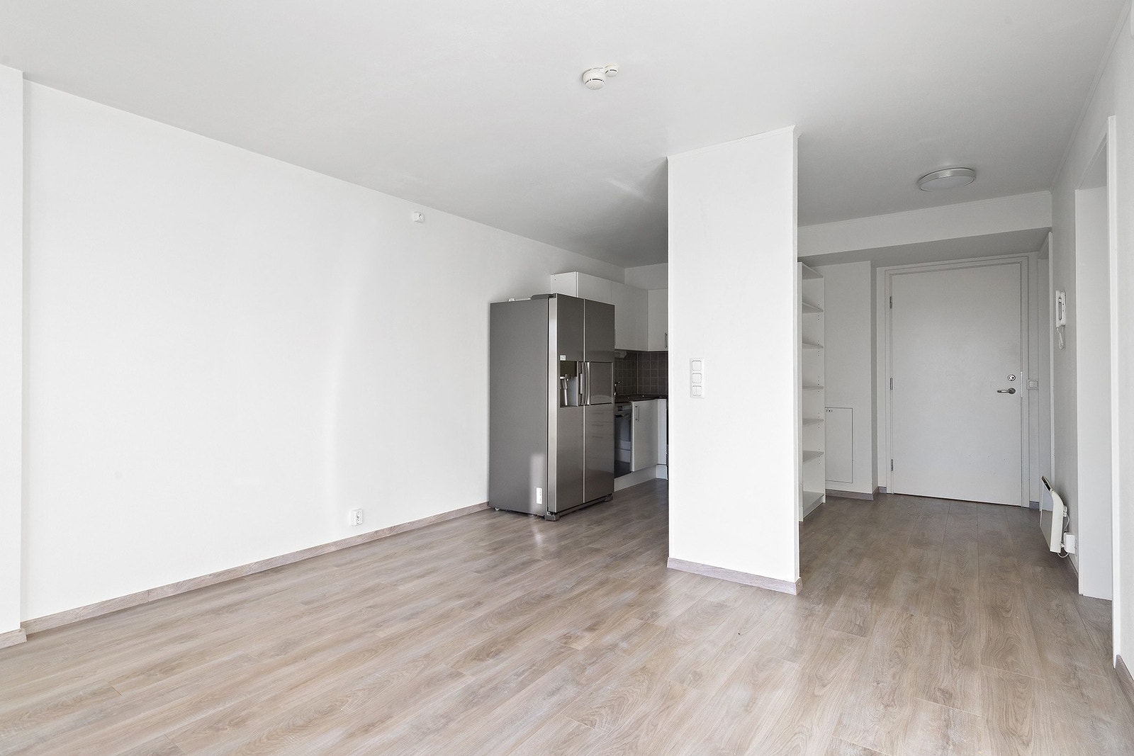 Stue og kjøkken i åpen løsning. Galleribilde