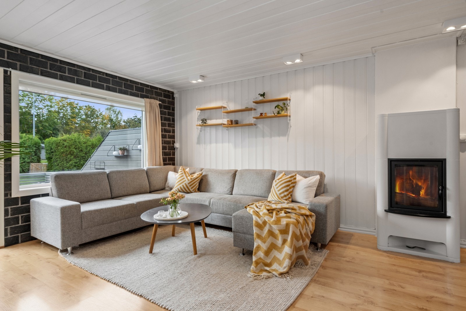 Peisinnsats i stuen gir ekstra varme og hygge på kalde dager. Galleribilde