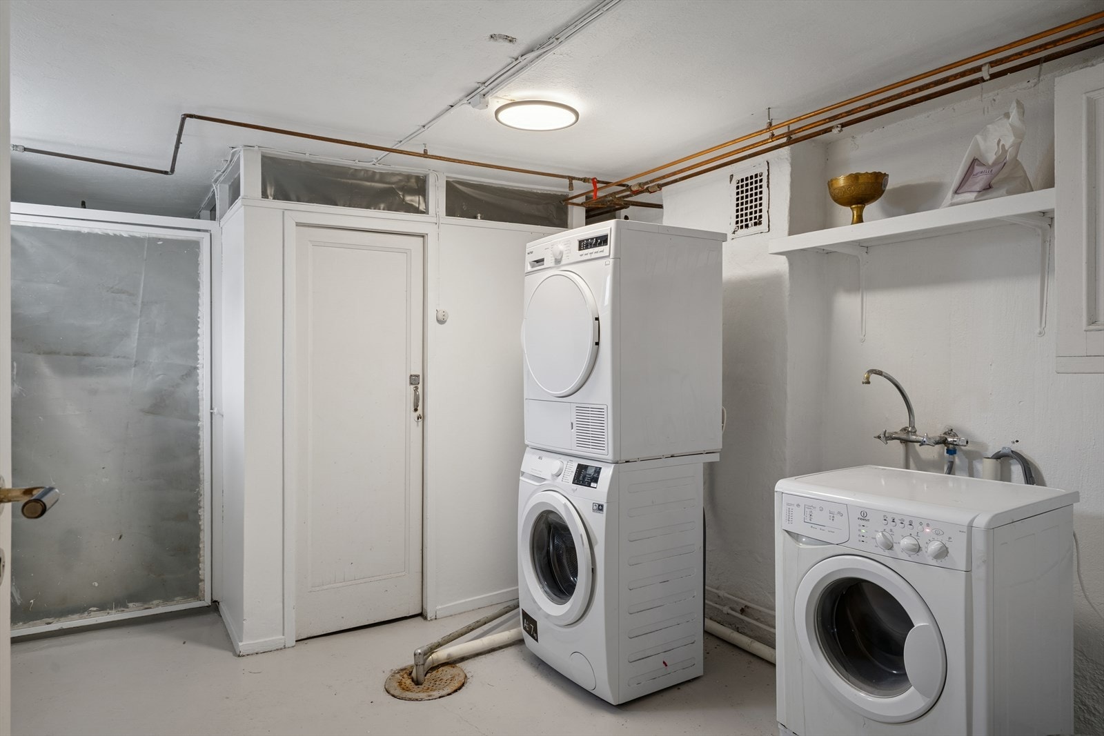 Det er felles vaskerom i kjelleren. Galleribilde