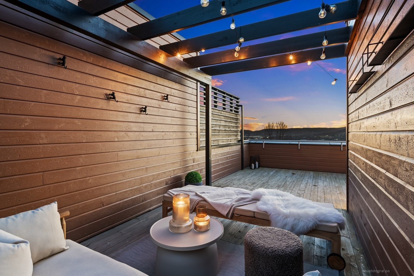 Denne takterrassen gir deg en perfekt kombinasjon av sol og privatliv! Galleribilde