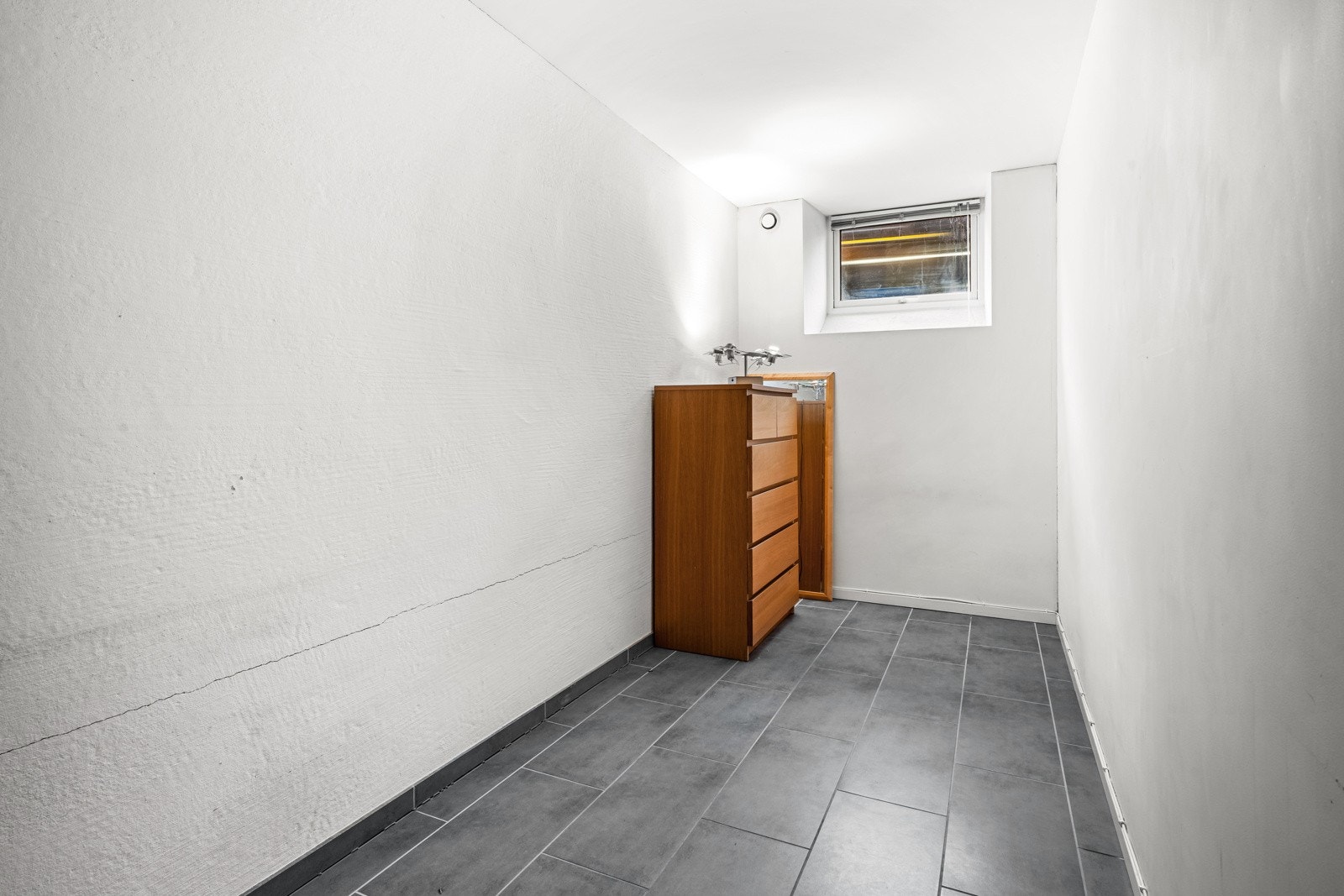 Praktisk rom som kan benyttes til lagringsplass Galleribilde