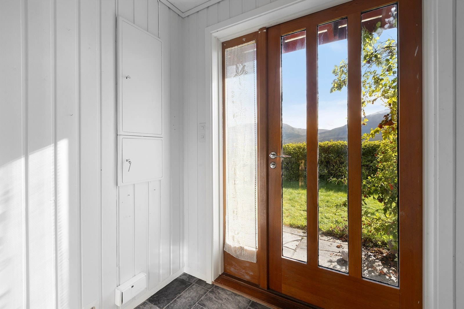 Entrè med glassdør. Galleribilde